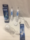 Pair of Oral B Vitality Battery Powered Toothbrushes with 3 Pack Heads