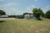 Tract 1: 3.15 Acre Commercial Property with RV Hook-Ups, Metal Workshop w/Office and Mobile Home