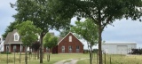 Tract 1: Custom Brick Home on 14.2 acres along with workshop w/ofc, cattle pens & large stock tank