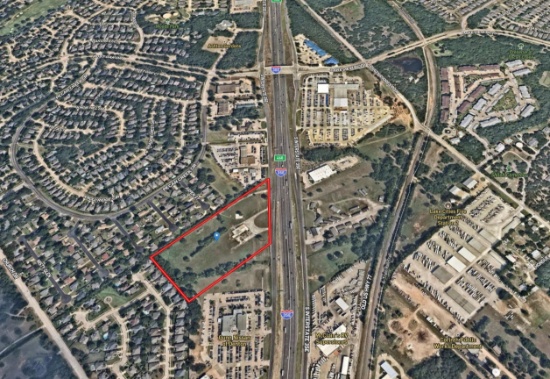10.6 Prime Commercial Acres with 640' of frontage on I-35E with 2 Double Sided Billboards