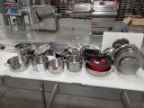 Assorted Stainless Steel Cooking Pots With Lids And Pan Holders And Meat Cutting Boards