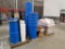 plastic hazmat drums, buckets, and a skid of vermiculite