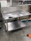 43 Inch Wide Stainless Steel Table With Drip Pan And Lower Shelf