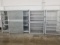 Metal Adjustable Shelf Storage Rack With Sliding Door and (4) Wire Storage Bins