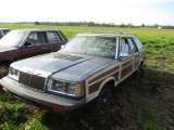 1986 CHRYSLER TOWN & COUNTRY STATION WAGON, VIN 1C38C59E3GF131169, 2X2 TURBO ENG, 4 CYL, FUEL INJECT