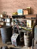 (2) BATTERY CHARGERS AND SHOP TABLE