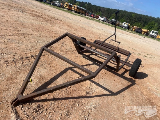 PULL BEHIND ROUND BALE HAULER