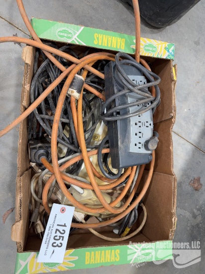 BOX OF ASSORTED POWER STRIPS AND ELECTRIC CORD