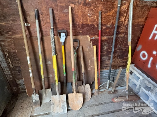Lot of assorted hand tools ( shovels, broom, pick, concrete rake)