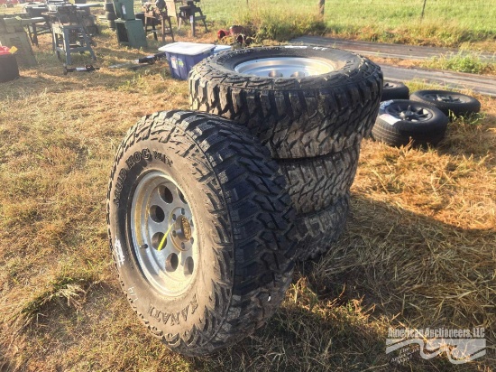 SET OF 4 37 X 12.5 MUD HOG TIRES AND 6 LUG RIMS