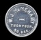 Thompson, ND ... W. J. McMenamy ... Good for 25 Cents Old Token