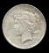 192-D ... Better Grade with Die Break ... Peace Dollar
