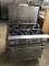 Wolf 6 burner stove with oven below