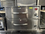 Wells 62 1/2” x 28 1/2” Heavy Duty S.S Worktable w/ Hot Food Well, built-in & Shelving
