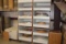 LAMINATE EDGE BANDING W/STORAGE RACK (ROLL OUT DRAWERS)