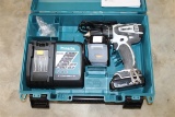 Makita 18V battery powered drill w/ charger and extra battery Unused