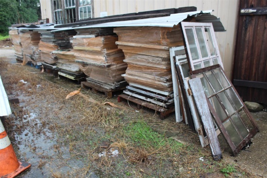 Lot of 9 pallets of salvaged antique New Orleans window sashes with and without original glass; asso