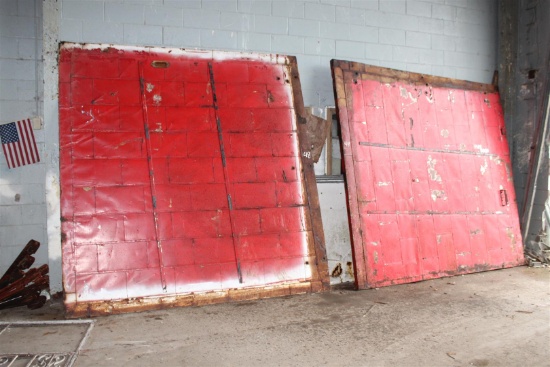 Lot of 2 vintage industrial red fire doors (rolling hardware included but detached from doors); dime