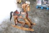 .  HAND CARVED WOOD ROCKING HORSE .