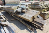 LOT OF POLES AND BOARDS
