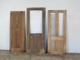 2 Reclaimed Antique Cypress four panel vertical doors