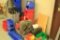 Assortment of stackable plastic storage bins