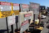 PALLET OF METAL SIGNS AND STANDS