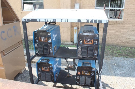 MILLER ELECTRIC 4 BANK WELDERS ON ROLL AROUND SKID S#'S LG430350A, LH040235A, LH370075A,
