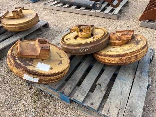 PALLET OF THREE EQUIPMENT TRACK IDLERS