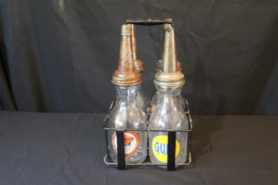 (4) GULF AND OILZUM OIL DISPENSE BOTTLES WITH RACK