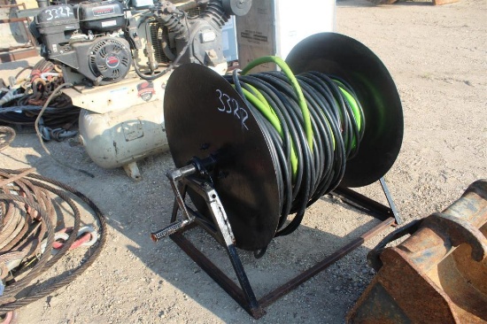 LOT OF HOSE REEL WITH STEAM PRESSURE HOSE AND PRESSURE WASHER HOSE