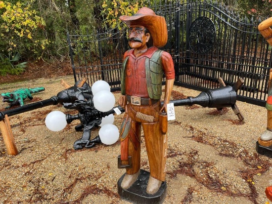 CARVED WOODEN COWBOY STATUE