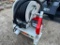 FUEL PUMP WITH METER AND RETRACTABLE HOSE
