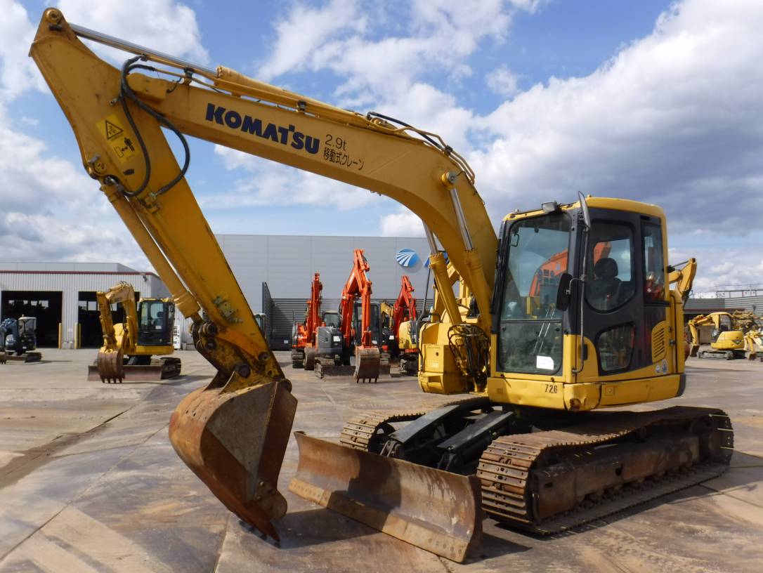 KOMATSU PC128US-8 22856 | Proxibid