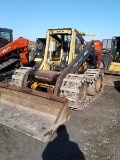 New Holland L785 Skid Steer Loader. 4524 hrs. W/ Steel Tracks & Rear Stabil