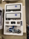 Winross  Truck with Double Van Trailers