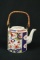 Oriental Tea Pitcher With Handle