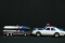Toy Greyhound Bus & Toy Police Cruiser