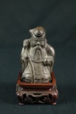 Asian Figurine On Stand