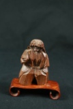 Asian Wooden Figurine On Stand