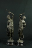 2 Cast Statues
