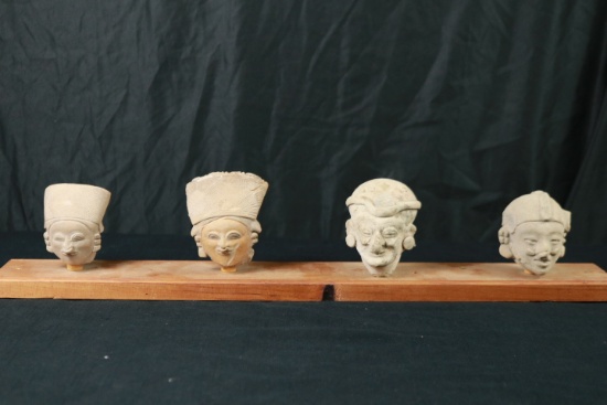 4 Stone Heads on Board