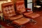 2 Leather Chairs & Ottomans On Chrome Bases