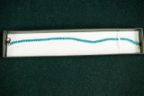 Sterling Silver Tennis Bracelet with Blue Ice