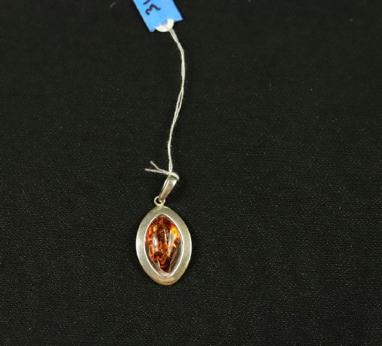 Sterling Silver Pendant With Amber Stone