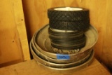 4 Cheverolet Hub Caps  & 4 Lawnmower Wheels