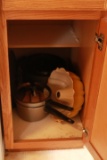 Cabinet of Assorted Cookware