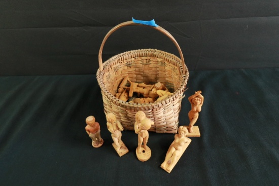 Basket of Wooden Figurines