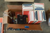 Box of Lionel Train Cars & Accessories