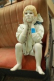 Bench Sitting Doll